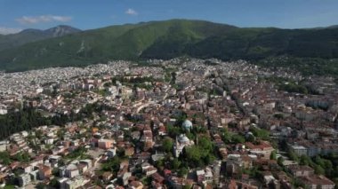 Aerial Bursa Green Mausoleum, green mosque and mausoleum square drone view, view of the big city of bursa in green