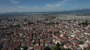 Panoramic historical settlement Bursa, urban city view, aerial view of metropolitan where people live, crowded cities, crowded large city centers of turkey