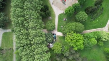 Aerial greenery public park, weekend activity place with every shade of green, famous bursa botanical park covered with green trees and grass from the air