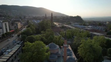 Bursa grand mosque in city, Drone view of historical Bursa Mosque from Ottoman times, historical texture structures settled in the city of Bursa
