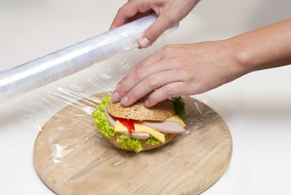 Food film envelop cheeseburger — Stock Photo, Image