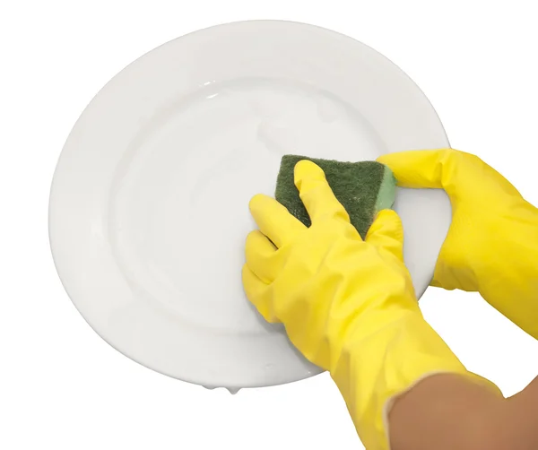 Manos en guantes amarillos lavar plato blanco — Foto de Stock