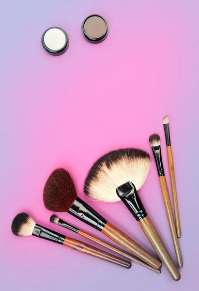 Cosmetics and brushes — Stock Photo, Image