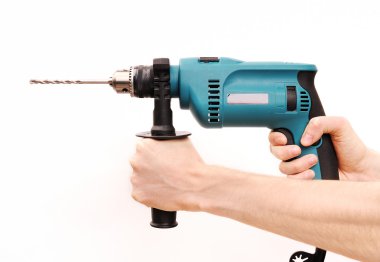 adamın elinde matkap