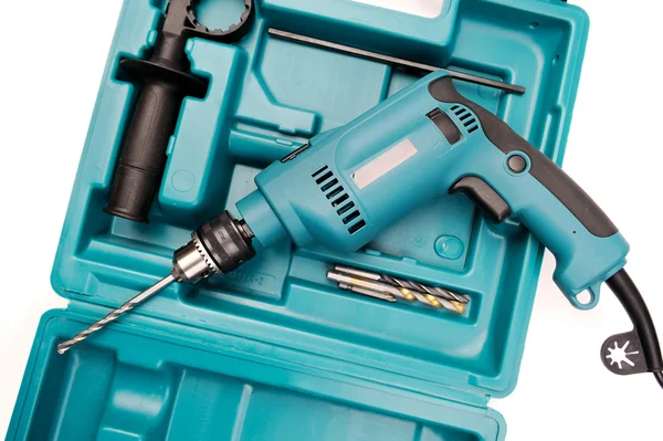 Electric drill in a toolbox — Stock Photo, Image