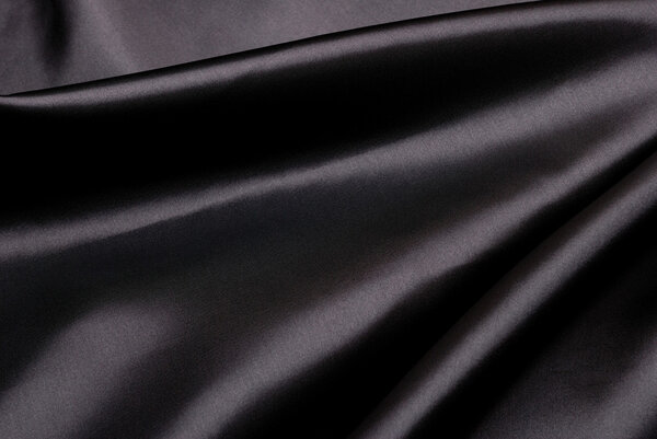 Black silk background.