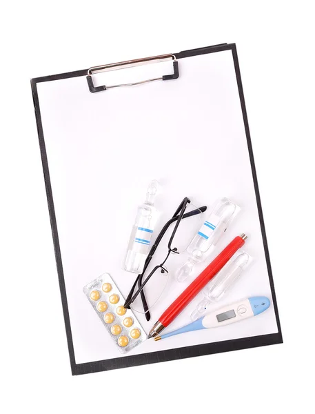 Medical clipboard with pills — Stock Photo, Image