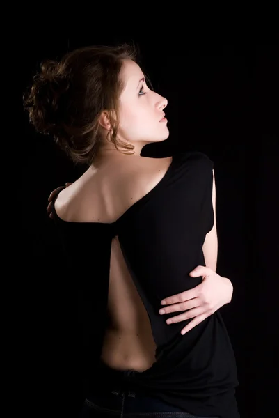 Застенчивая девушка, достойная спины — стоковое фото