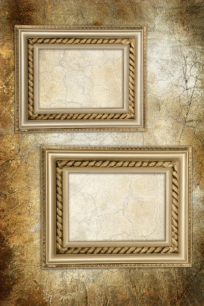 Wall with antique frames — Stock Photo, Image