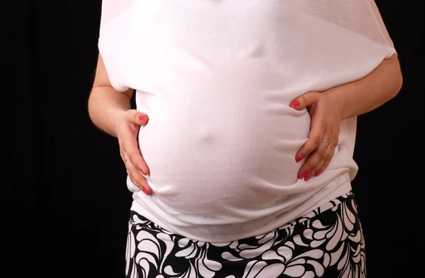 Maag van de zwangere vrouw — Stockfoto