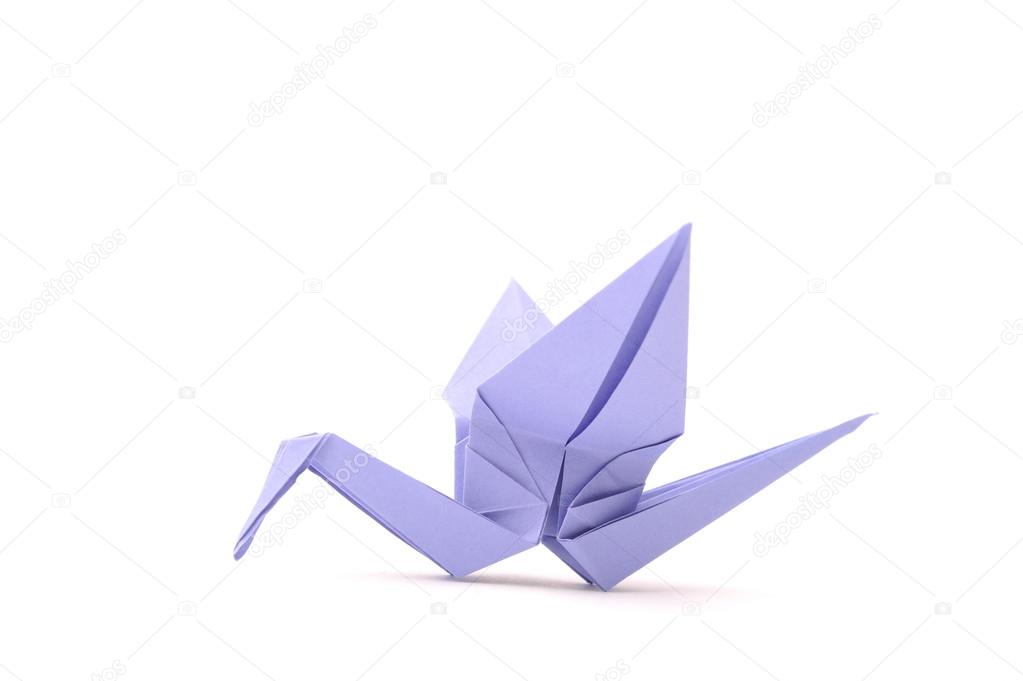 Origami bird. Child paper articles.