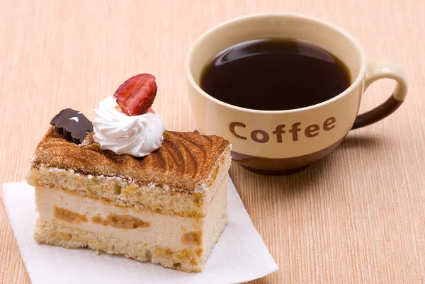 Gâteau avec tasse de café — Photo