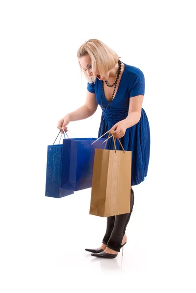 Surprised young woman with purchase Stock Image