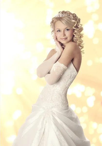 Portrait of a bride on yellow bokeh background. — Stock Photo, Image