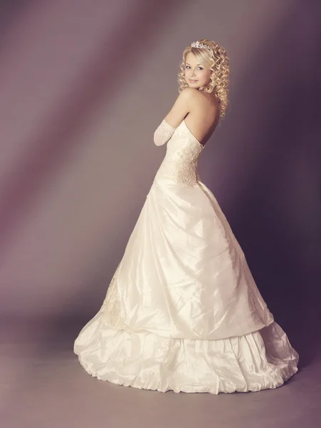 Bride over gray background, studio shot. — Stock Photo, Image