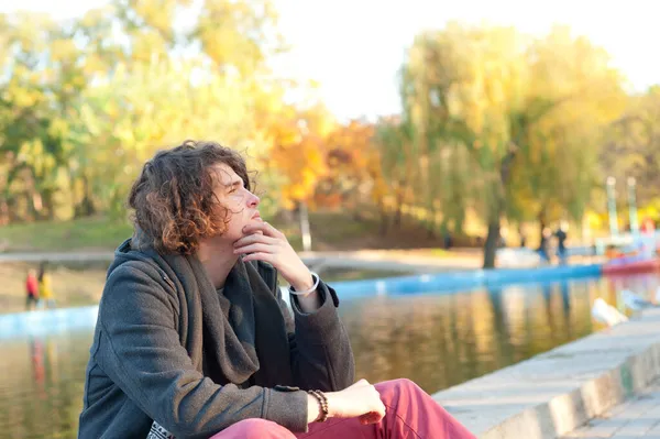 Teen Man Profile Portrait Sitting City Lake Oudoor Autumn Park — Stock Photo, Image