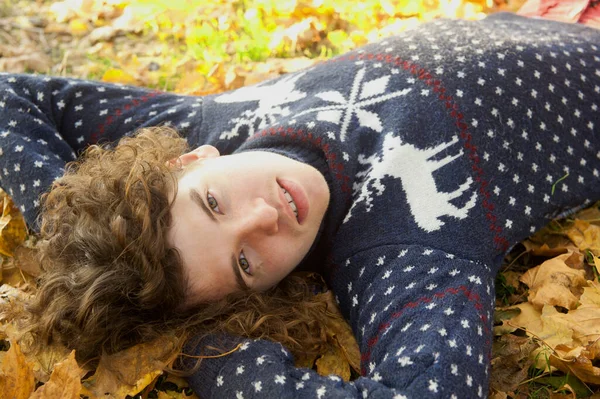 Young Man Long Curly Hair Knit Sweater Scarf Lying Autumn — Stock Photo, Image