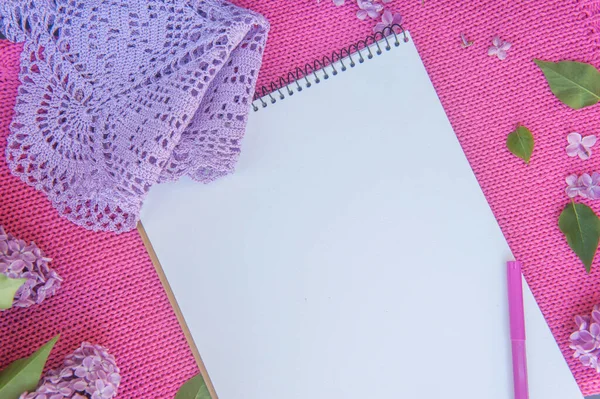 White album list mockup with empty space notebook list on pink knitted bakdrop