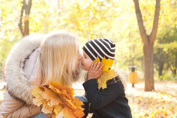 Happy Joyful Family Portrait Mother Kiss Daughter Autumn Forest Leaves — Stok fotoğraf