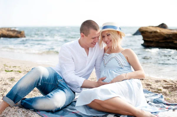 Happy Future Parents Couple Have Rest Sitting Ocean Husband Hugs — Foto Stock