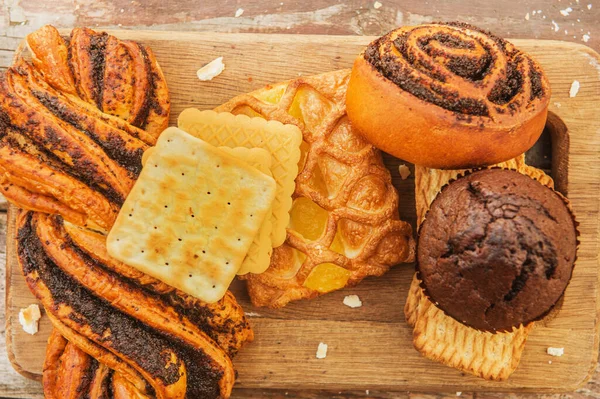 Assorted Pastries Vintage Style Wooden Backdrop Flat Lay View — Stock Photo, Image