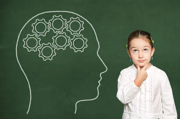 Cogs, racks in head on chalkboard — Stock Photo, Image