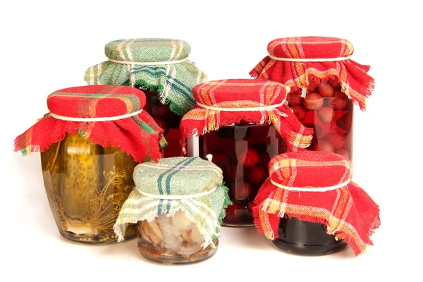Jars of preserves on white — Stock Photo, Image