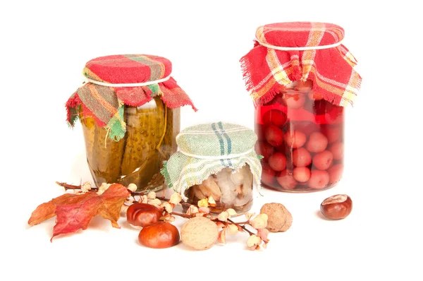 Jars of stocks for the winter on white — Stock Image Jars of stocks for the winter on white Royalty Free Stock Images