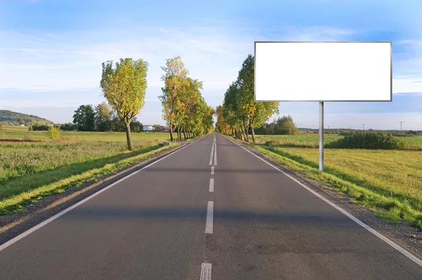 Billboard na venkovské silnici — Stock fotografie