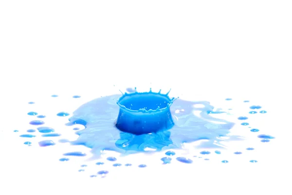 Blue paint splashing on white — Stock Photo, Image