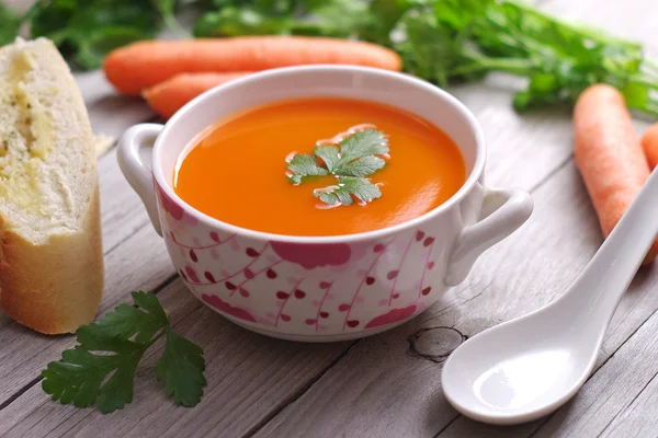 Carrot  soup in a porcelain bowl. — Stock Photo, Image