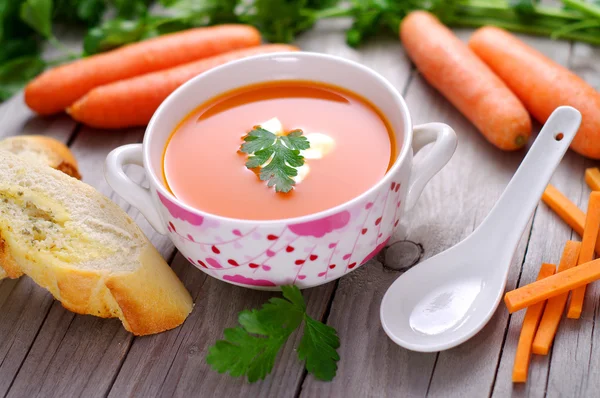 Carrot  soup in a porcelain bowl. — Stock Photo, Image