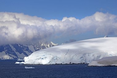 Sailing through the Lemaire Channel, Antarctica clipart