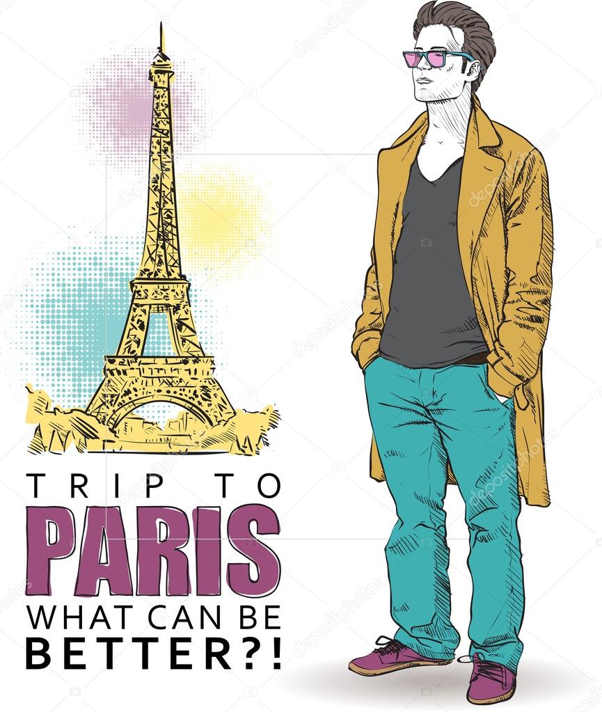 Young stylish guy on a eiffel tower background.