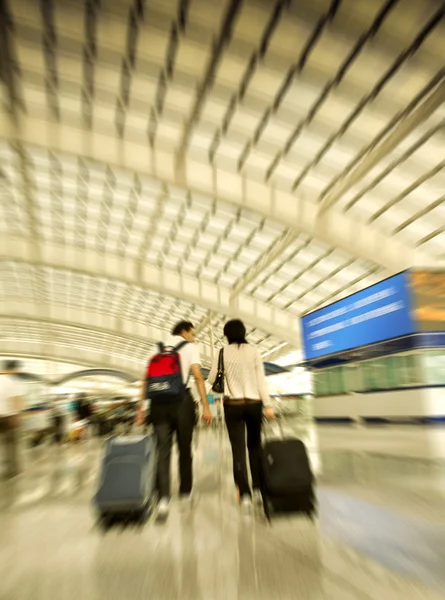 Passengers walk at the Beijing International Airport — Stock Photo, Image