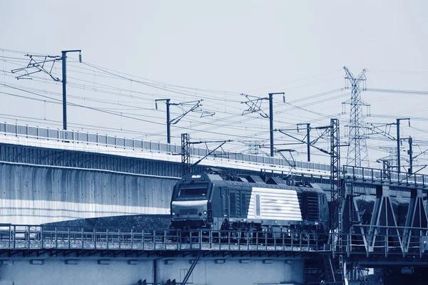 Train cars and high-speed rail — Stock Photo, Image