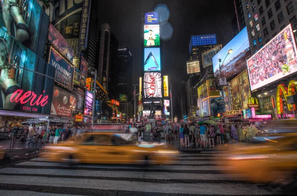 Abstract taxis in Times Square — Stock Photo, Image