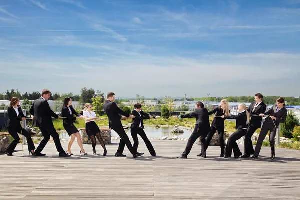 Business Teamwork People pulling on rope — Stock Photo, Image