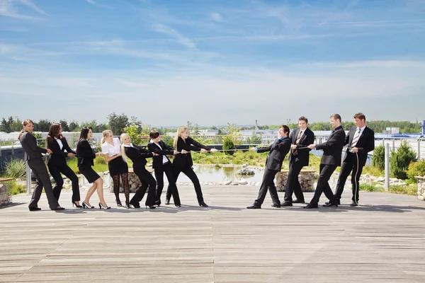 Business Teamwork People pulling on rope — Stock Photo, Image