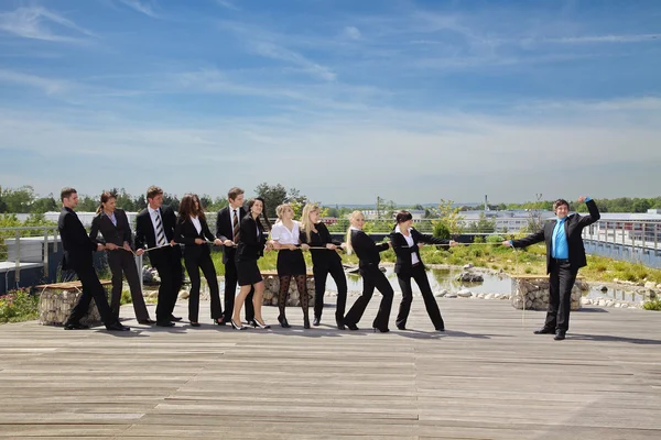 Business Teamwork People pulling on rope — Stock Photo, Image