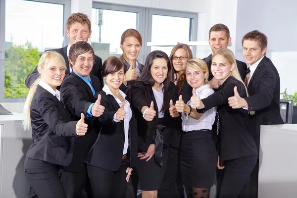 Businessmen show thumbs up — Stock Photo, Image