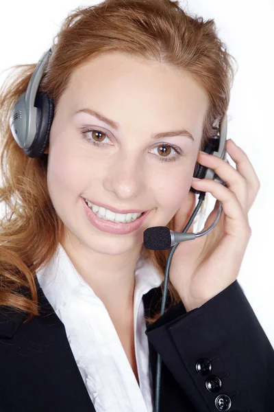 Businesswoman with headphones — Stock Photo, Image