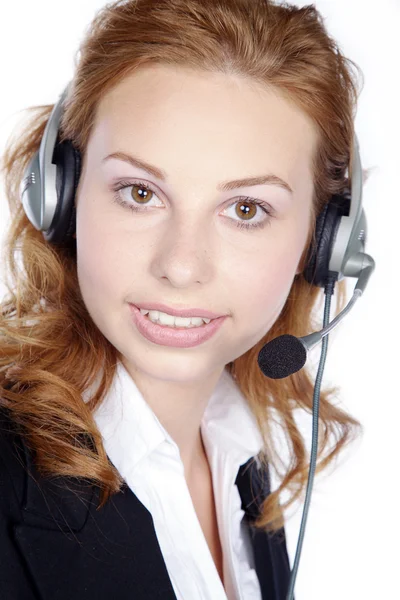Mulher de negócios com fones de ouvido — Fotografia de Stock