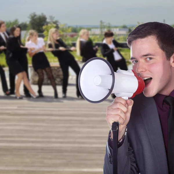 Empresário com um megafone — Fotografia de Stock