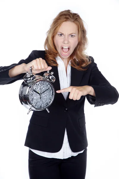 Affärskvinna med en klocka — Stockfoto