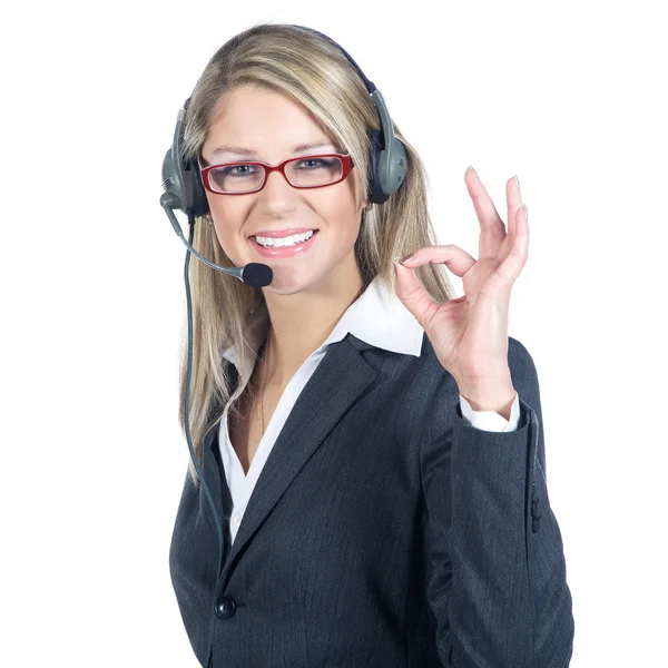 Forretningskvinne med hodetelefoner – stockfoto