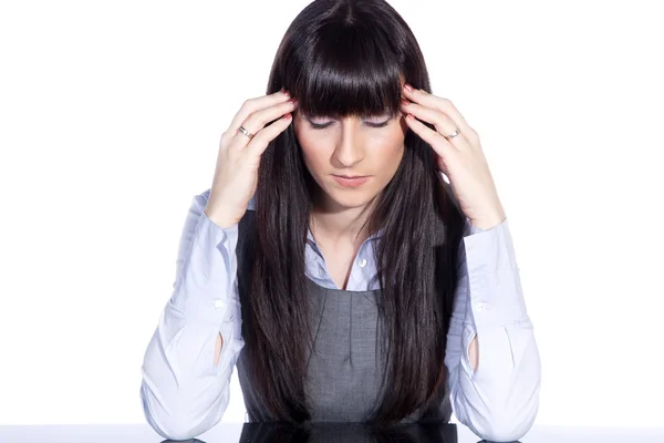 Businesswoman with a headache — Stock Photo, Image