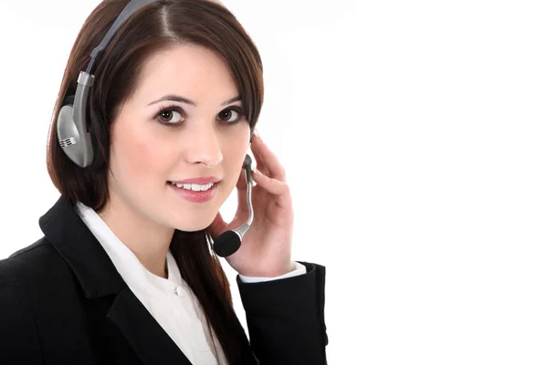 Mulher de negócios com fones de ouvido — Fotografia de Stock