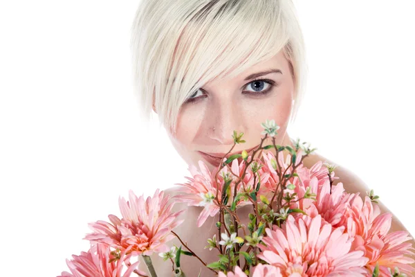 Blonde girl with a pink flowers Stock Photo