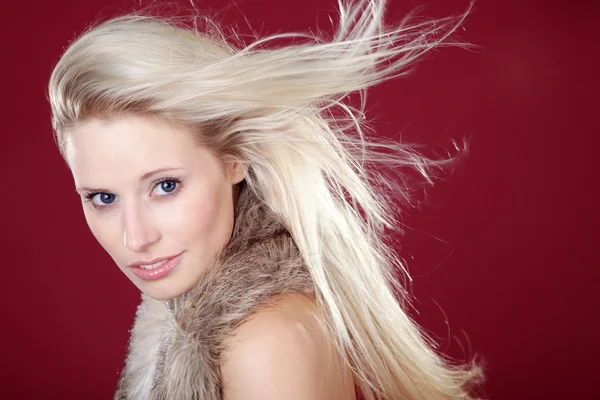 Glamorous blonde in animal fur — Stock Photo, Image